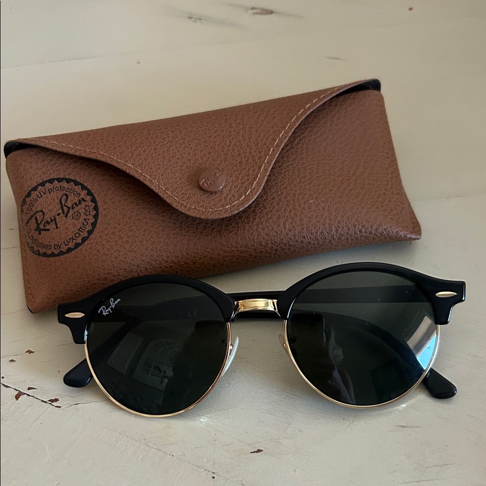 Ray-Ban Black Frame Sunglasses with Gold Trim